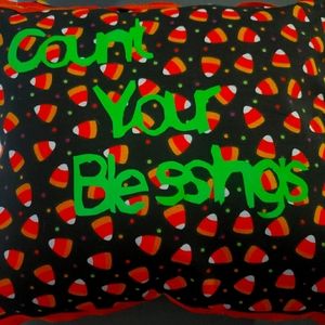 Pillow with candy corns. Says Count your blessings!!